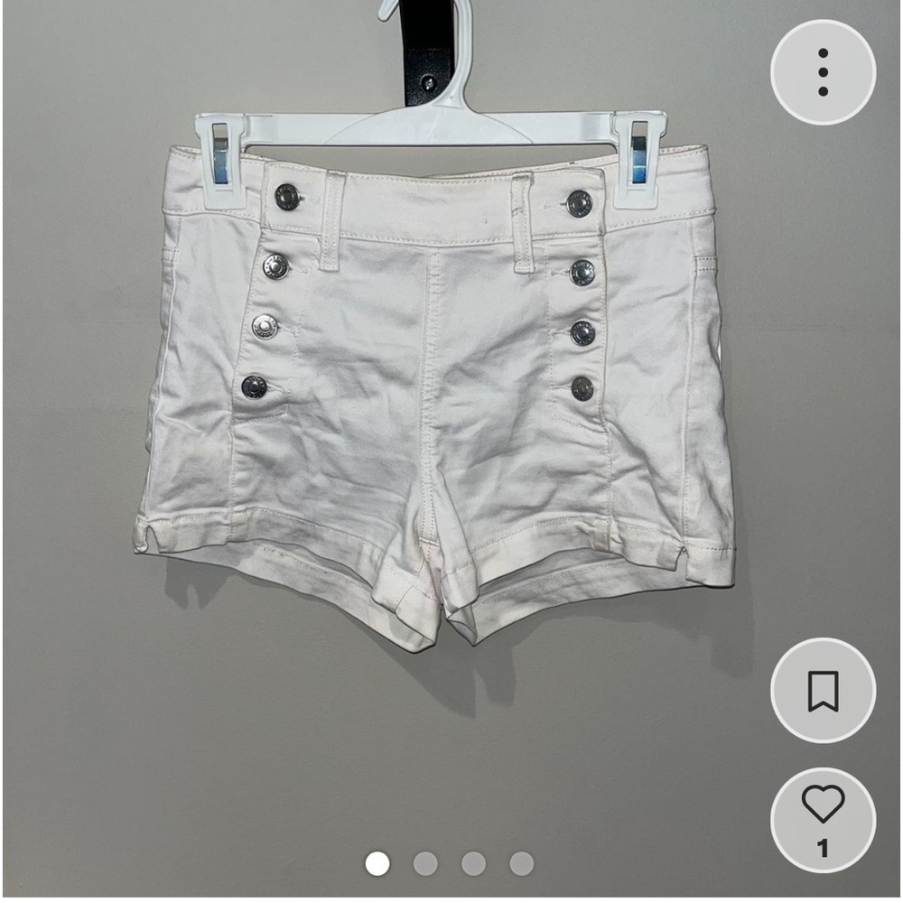 Shorts with embroidered buttons